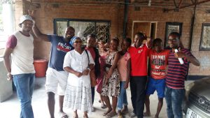 Some of the youths with Mrs Chipili a senior friend